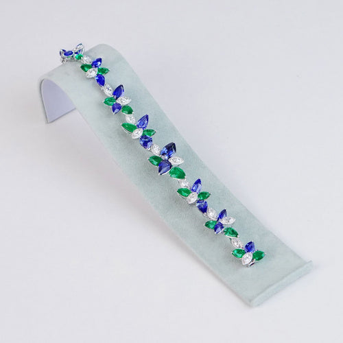 25.79  12.18 cts Pear Shape Emerald with Blue Sapphire Bracelet (ENQUIRE)